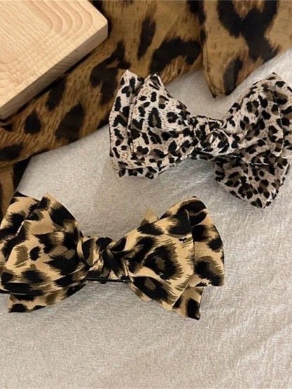 1pc Leopard Print Bow Hair Clip, Suitable For Daily Wear, Practical And Easy To Use, Exquisite Design, Can Fix Ponytail Hairstyle. New Fashion High Top Ponytail Hair Clip, Suitable For High-End Occasi
