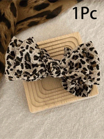1pc Leopard Print Bow Hair Clip, Suitable For Daily Wear, Practical And Easy To Use, Exquisite Design, Can Fix Ponytail Hairstyle. New Fashion High Top Ponytail Hair Clip, Suitable For High-End Occasi