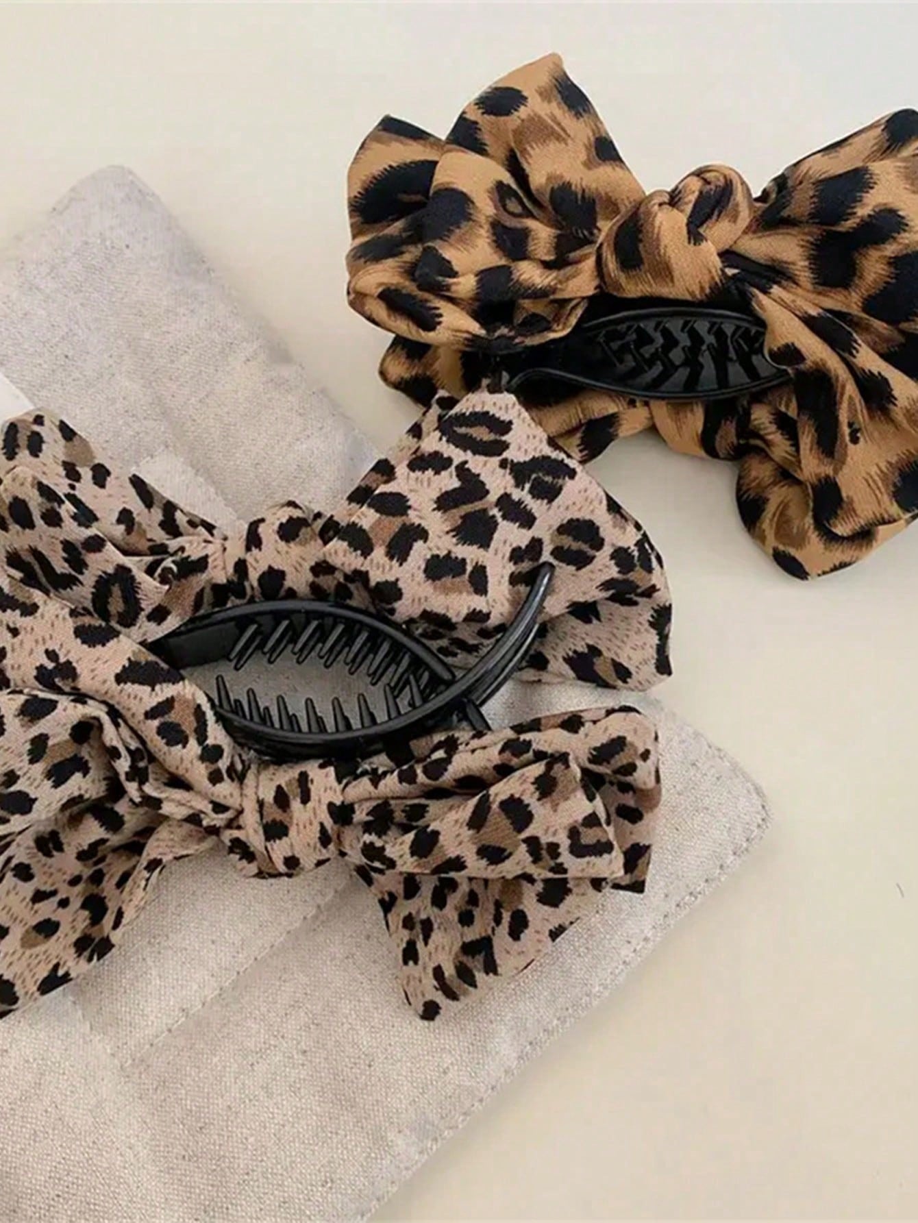 1pc Leopard Print Bow Hair Clip, Suitable For Daily Wear, Practical And Easy To Use, Exquisite Design, Can Fix Ponytail Hairstyle. New Fashion High Top Ponytail Hair Clip, Suitable For High-End Occasi