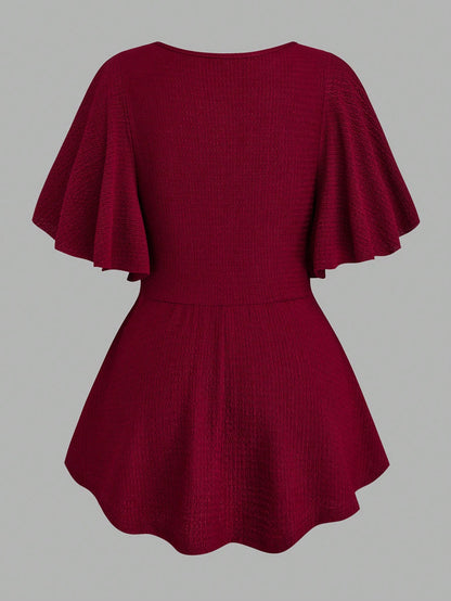 EMERY ROSE Plus Size Women's Spring/Summer V-Neck Knit Top With Chain, Ruffle Hem And Twist Waist Design, Elegant And Graceful A-Line