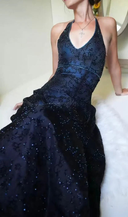Backless purple lace evening gown with halter tie and mermaid silhouette train