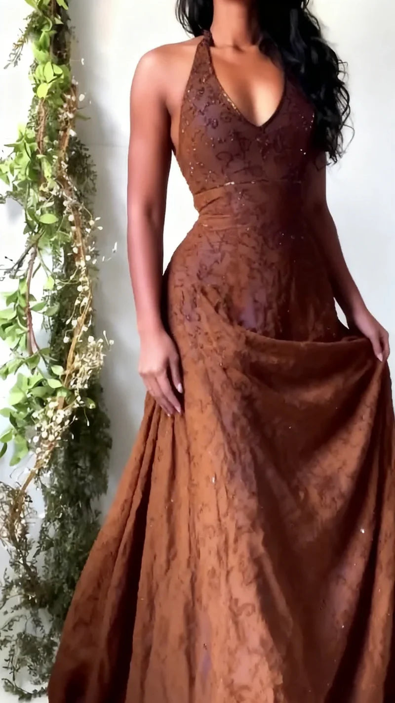 Model wearing vintage-inspired purple halter neck lace dress for Prom 2026