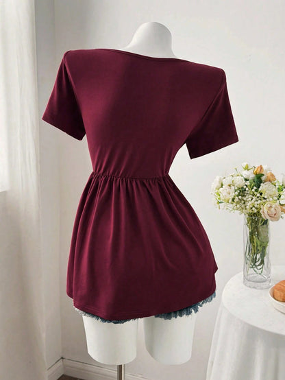 Sweetra Plus Size Women's Solid Color Twist Front Short Sleeve T-Shirt