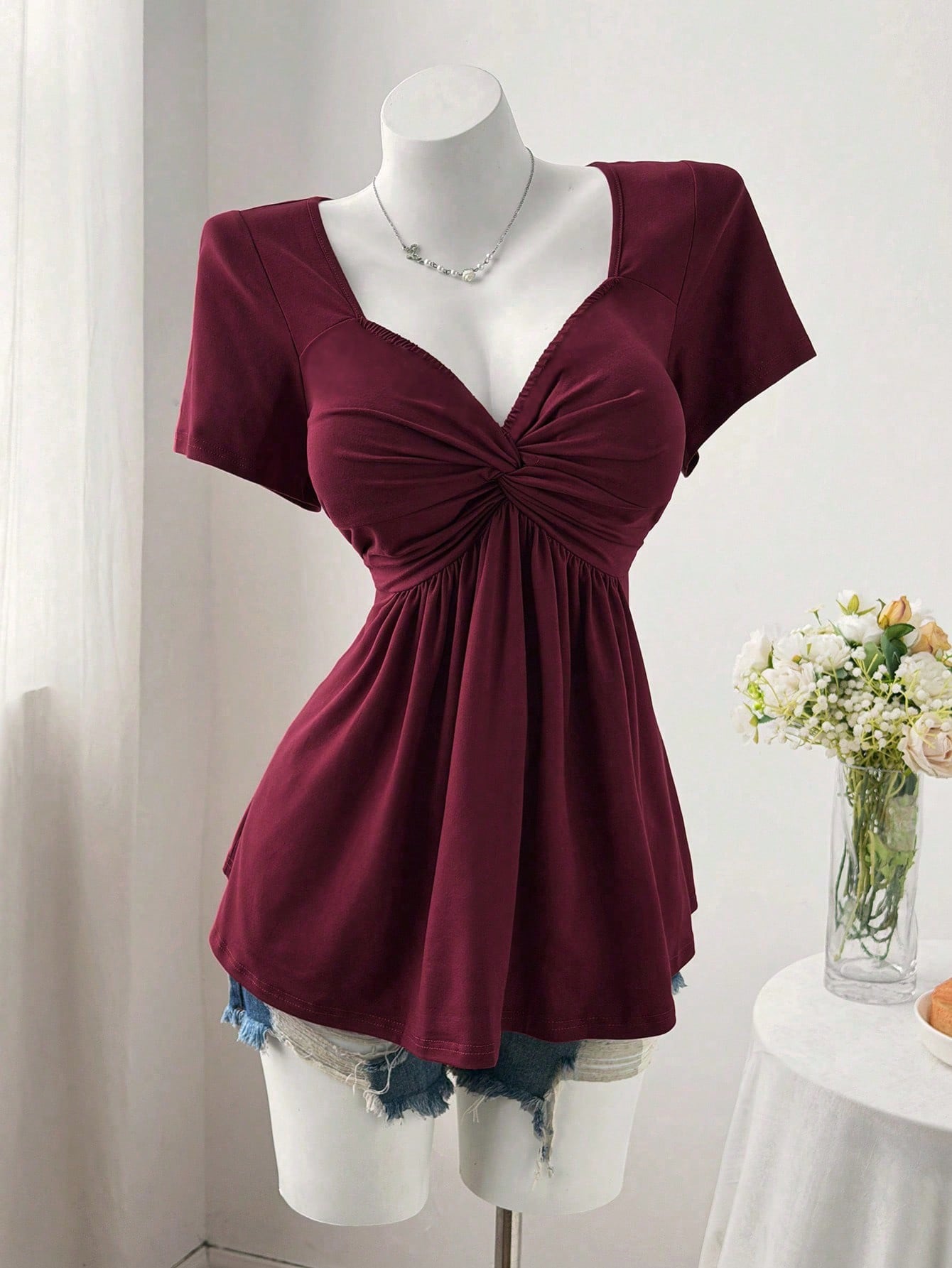Sweetra Plus Size Women's Solid Color Twist Front Short Sleeve T-Shirt