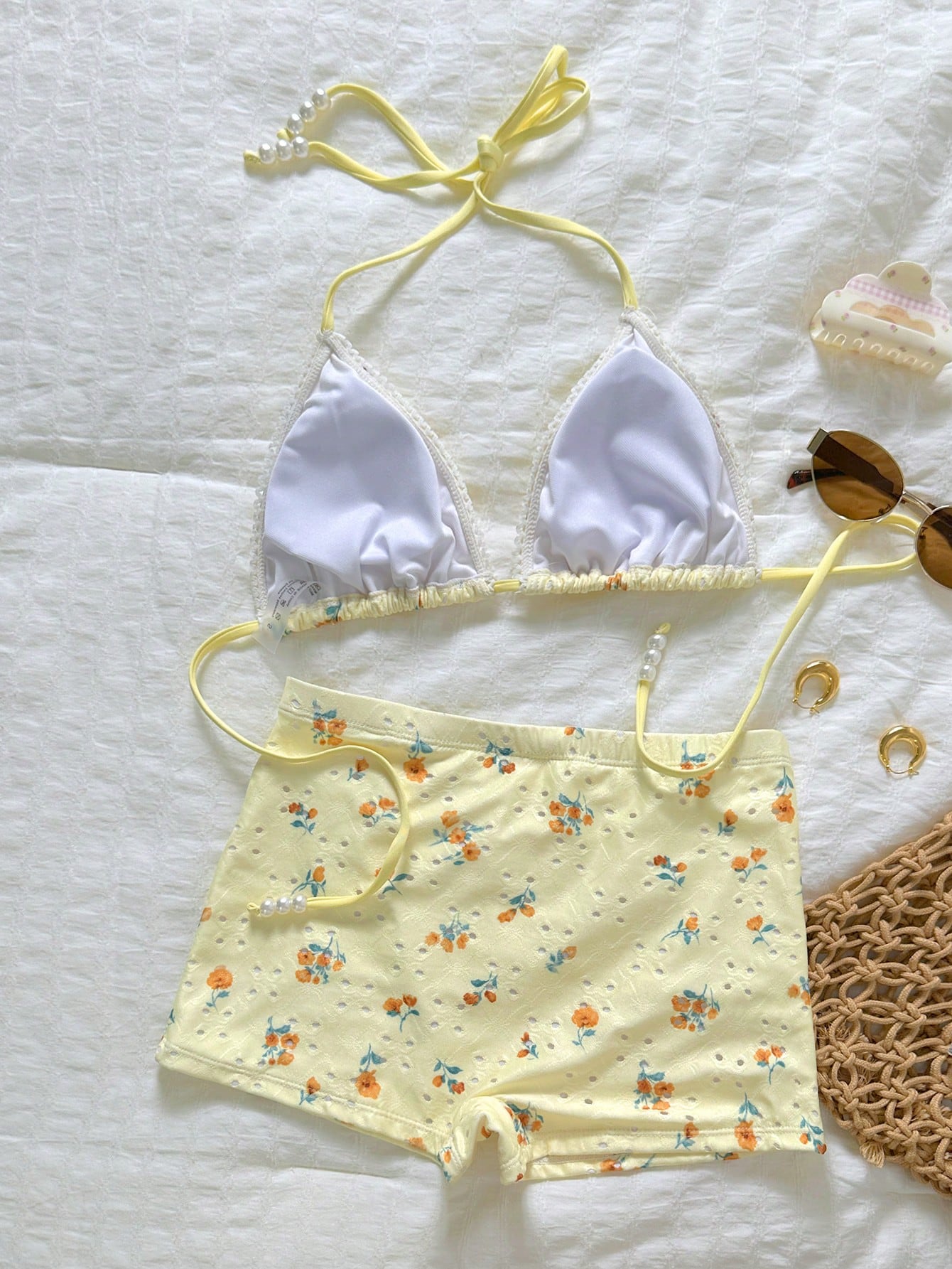 Swim Mod Women's Summer Floral Hollow Fabric Halter Neck Triangle Cup Pearl Decor Swimwear Set With Tie-Up Bottoms