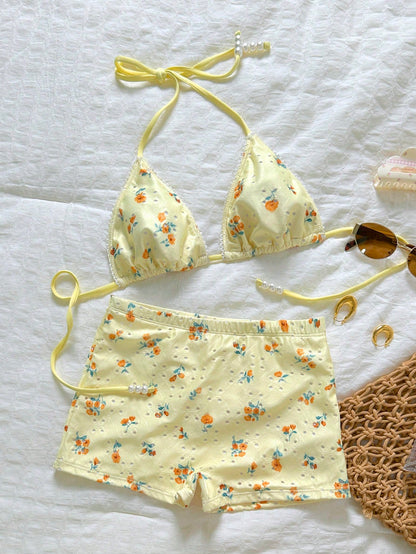 Swim Mod Women's Summer Floral Hollow Fabric Halter Neck Triangle Cup Pearl Decor Swimwear Set With Tie-Up Bottoms