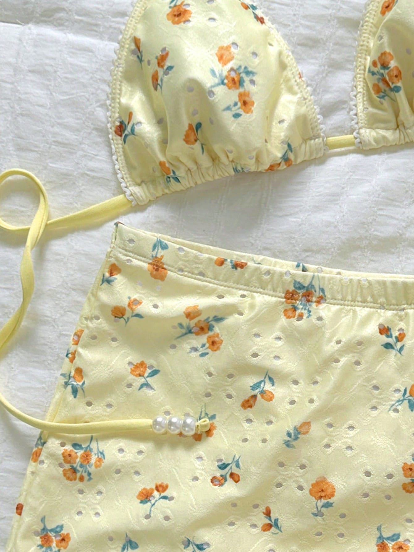 Swim Mod Women's Summer Floral Hollow Fabric Halter Neck Triangle Cup Pearl Decor Swimwear Set With Tie-Up Bottoms