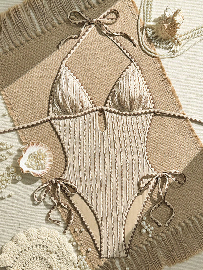 Vaytide 2026 New Spring/Summer Women's Vintage Maillard Brown Textured One-Piece Swimsuit, Triangle Halter Neck Design With Hollow Chest And Metal Pendant, Adjustable Side Ties, Wavy Textured Fabric